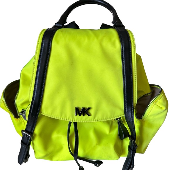 MICHAEL Michael Kors Handbags - Neon colored Michael Kors backpack style purse. A couple spots need wiped
